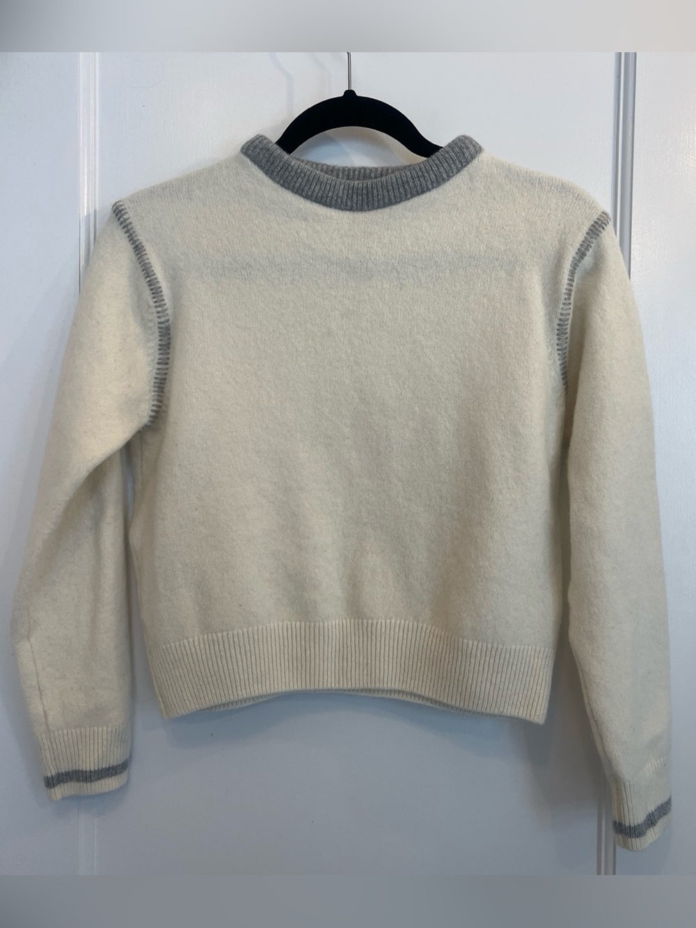 JW Anderson for Uniqlo cream wool sweater with contrast stitching, size medium